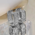 Pavelina Huggie Hoop Earrings